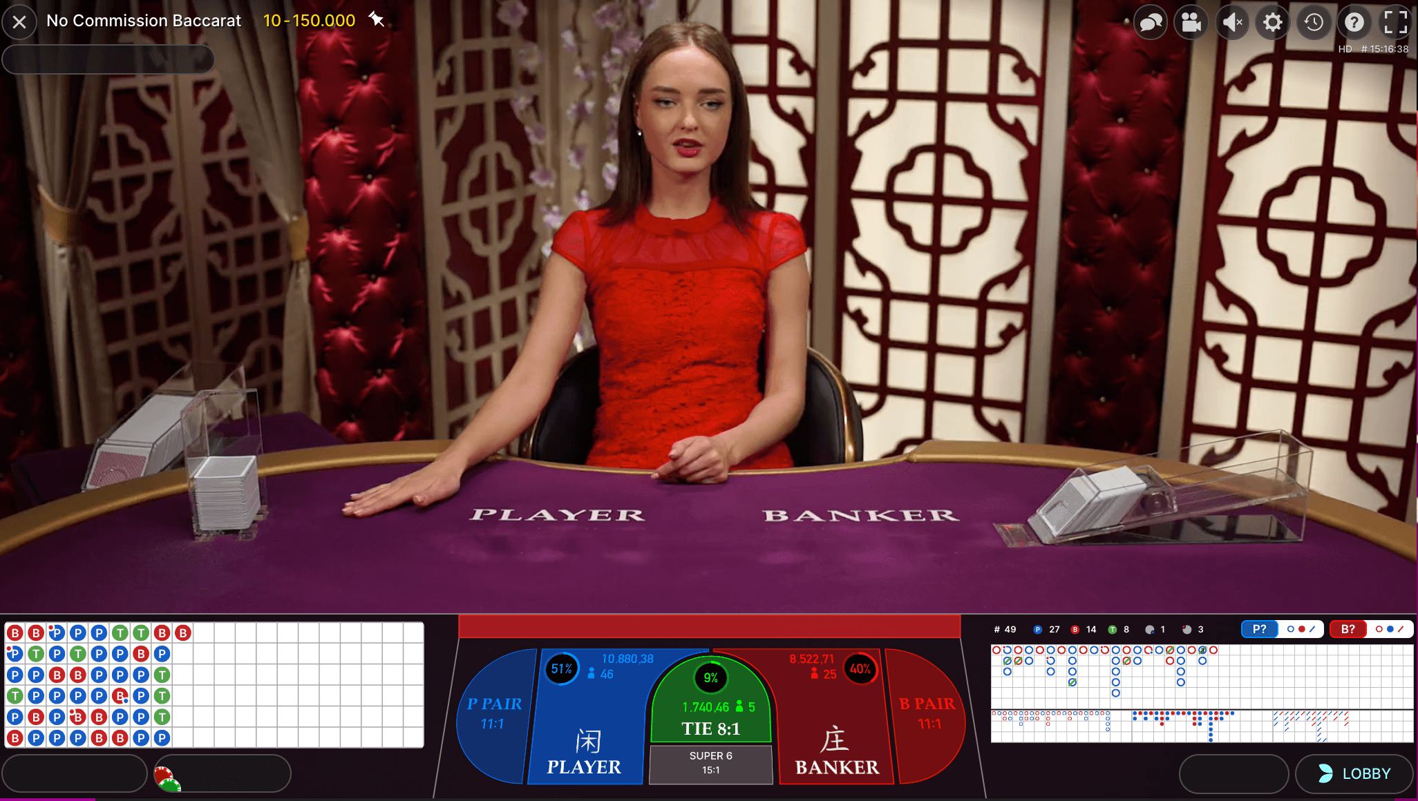 live dealer at baccarat table with road interface